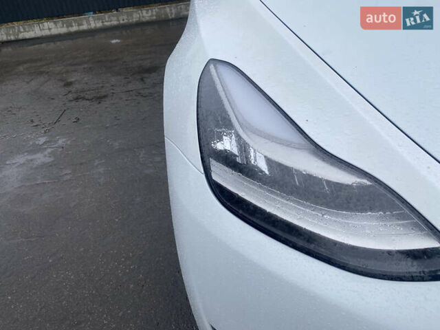 Білий Тесла Model Y, об'ємом двигуна 0 л та пробігом 70 тис. км за 24500 $, фото 36 на Automoto.ua