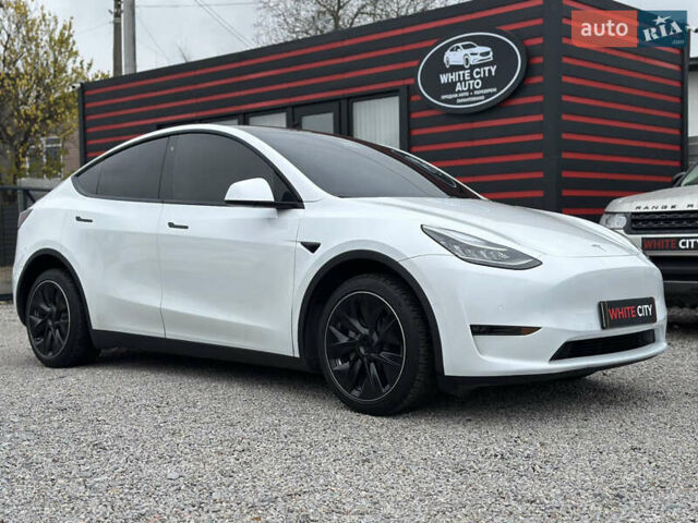Білий Тесла Model Y, об'ємом двигуна 0 л та пробігом 66 тис. км за 19500 $, фото 2 на Automoto.ua
