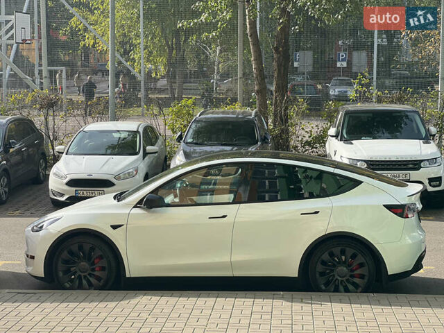 Белый Тесла Model Y, объемом двигателя 0 л и пробегом 62 тыс. км за 30000 $, фото 16 на Automoto.ua