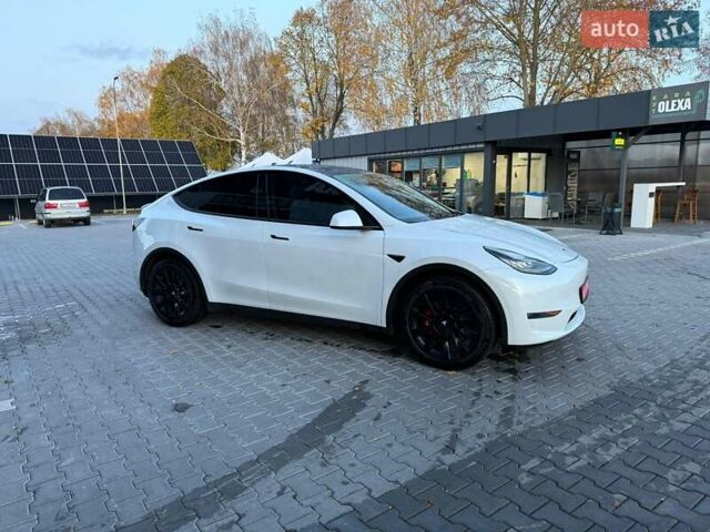 Белый Тесла Model Y, объемом двигателя 0 л и пробегом 132 тыс. км за 20800 $, фото 127 на Automoto.ua