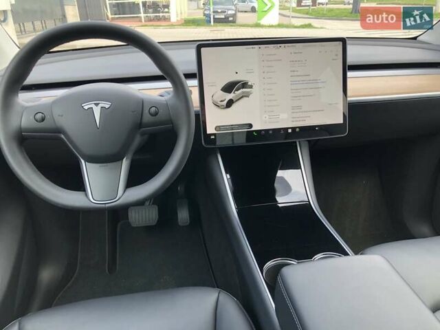 Белый Тесла Model Y, объемом двигателя 0 л и пробегом 51 тыс. км за 26000 $, фото 11 на Automoto.ua
