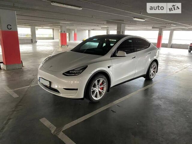 Білий Тесла Model Y, об'ємом двигуна 0 л та пробігом 61 тис. км за 25399 $, фото 7 на Automoto.ua