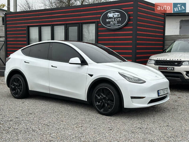 Білий Тесла Model Y, об'ємом двигуна 0 л та пробігом 66 тис. км за 19500 $, фото 6 на Automoto.ua