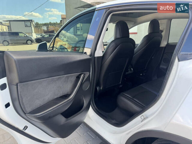 Белый Тесла Model Y, объемом двигателя 0 л и пробегом 108 тыс. км за 21300 $, фото 29 на Automoto.ua