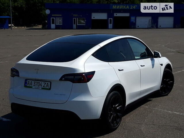 Білий Тесла Model Y, об'ємом двигуна 0 л та пробігом 18 тис. км за 59500 $, фото 10 на Automoto.ua