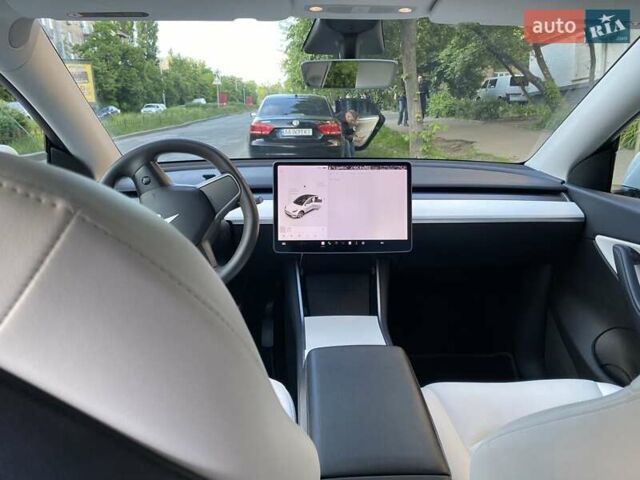 Белый Тесла Model Y, объемом двигателя 0 л и пробегом 49 тыс. км за 24850 $, фото 5 на Automoto.ua