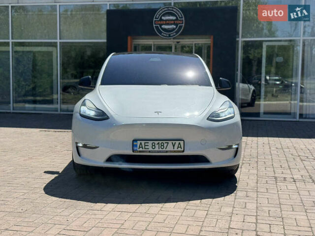 Белый Тесла Model Y, объемом двигателя 0 л и пробегом 84 тыс. км за 28000 $, фото 27 на Automoto.ua