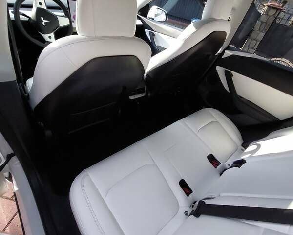 Белый Тесла Model Y, объемом двигателя 0 л и пробегом 113 тыс. км за 24700 $, фото 75 на Automoto.ua