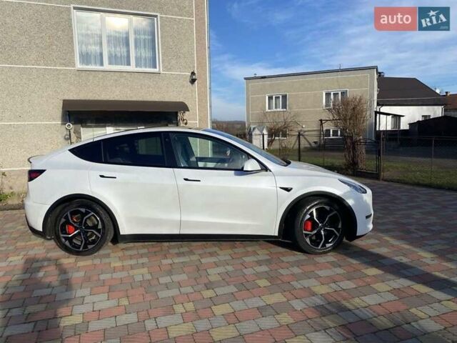 Белый Тесла Model Y, объемом двигателя 0 л и пробегом 113 тыс. км за 24700 $, фото 41 на Automoto.ua