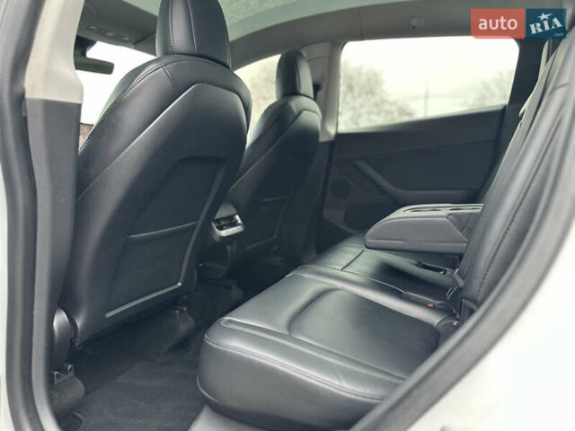 Білий Тесла Model Y, об'ємом двигуна 0 л та пробігом 66 тис. км за 19500 $, фото 25 на Automoto.ua