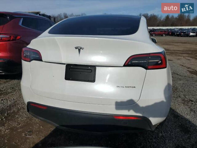 Белый Тесла Model Y, объемом двигателя 0 л и пробегом 61 тыс. км за 9450 $, фото 3 на Automoto.ua