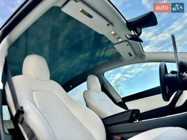 Белый Тесла Model Y, объемом двигателя 0 л и пробегом 57 тыс. км за 28500 $, фото 36 на Automoto.ua