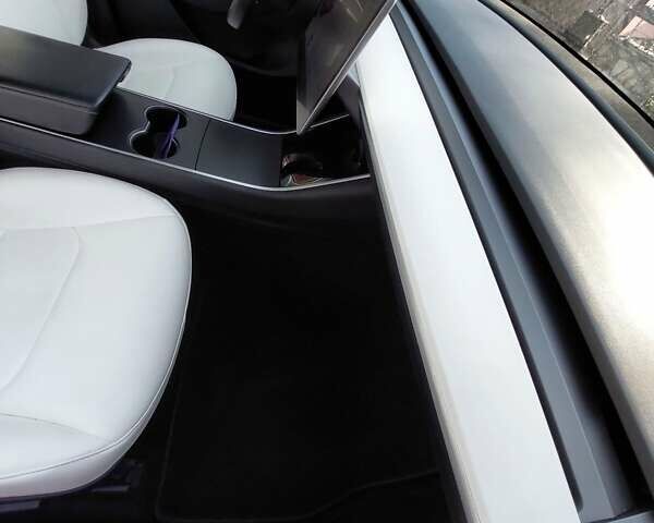 Белый Тесла Model Y, объемом двигателя 0 л и пробегом 113 тыс. км за 24700 $, фото 83 на Automoto.ua