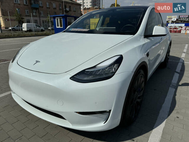 Белый Тесла Model Y, объемом двигателя 0 л и пробегом 97 тыс. км за 23899 $, фото 1 на Automoto.ua