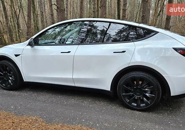 Белый Тесла Model Y, объемом двигателя 0 л и пробегом 71 тыс. км за 27900 $, фото 1 на Automoto.ua