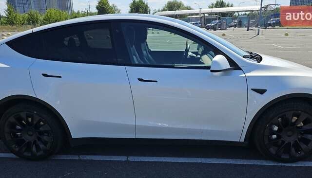 Белый Тесла Model Y, объемом двигателя 0 л и пробегом 110 тыс. км за 20499 $, фото 3 на Automoto.ua