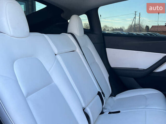 Белый Тесла Model Y, объемом двигателя 0 л и пробегом 73 тыс. км за 24800 $, фото 20 на Automoto.ua