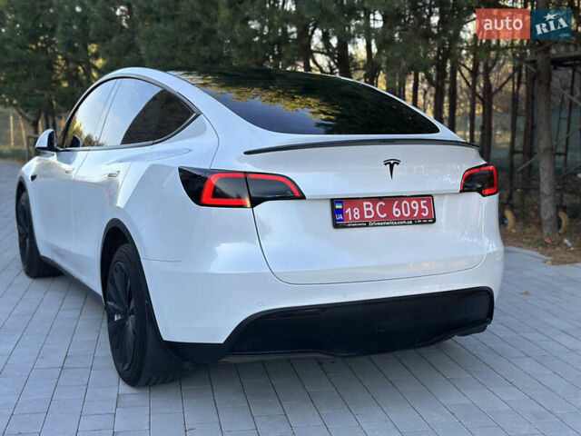 Белый Тесла Model Y, объемом двигателя 0 л и пробегом 118 тыс. км за 21700 $, фото 54 на Automoto.ua