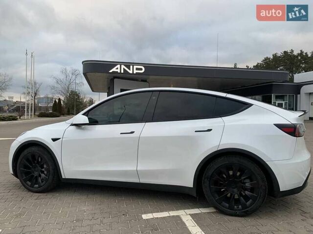 Белый Тесла Model Y, объемом двигателя 0 л и пробегом 90 тыс. км за 22000 $, фото 5 на Automoto.ua