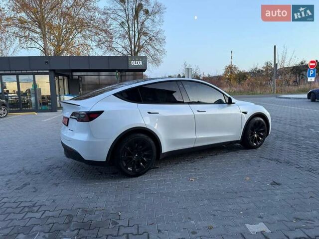 Белый Тесла Model Y, объемом двигателя 0 л и пробегом 132 тыс. км за 20800 $, фото 123 на Automoto.ua