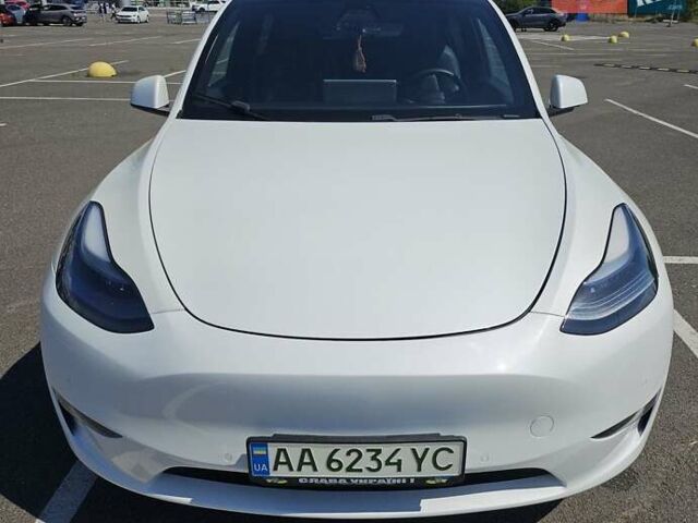 Белый Тесла Model Y, объемом двигателя 0 л и пробегом 110 тыс. км за 20499 $, фото 1 на Automoto.ua