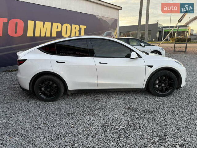 Білий Тесла Model Y, об'ємом двигуна 0 л та пробігом 100 тис. км за 21499 $, фото 19 на Automoto.ua