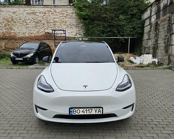 Белый Тесла Model Y, объемом двигателя 0 л и пробегом 74 тыс. км за 23000 $, фото 1 на Automoto.ua
