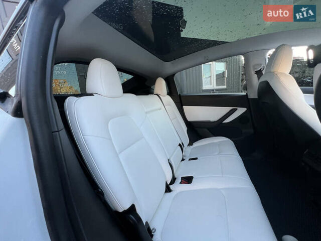 Белый Тесла Model Y, объемом двигателя 0 л и пробегом 55 тыс. км за 23490 $, фото 11 на Automoto.ua