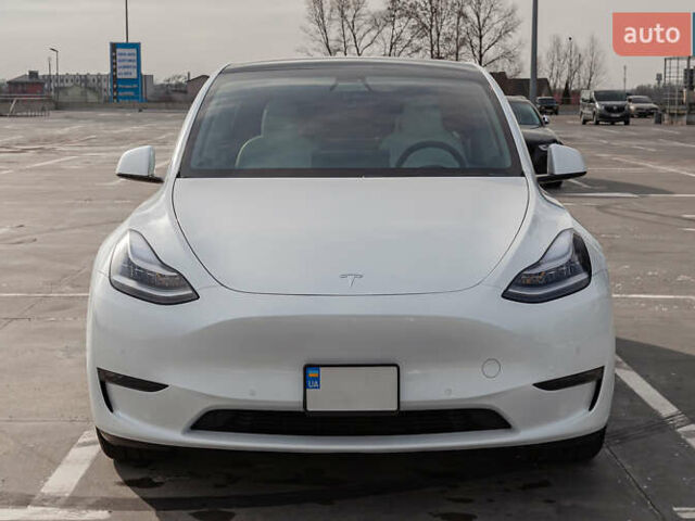 Белый Тесла Model Y, объемом двигателя 0 л и пробегом 17 тыс. км за 53900 $, фото 1 на Automoto.ua