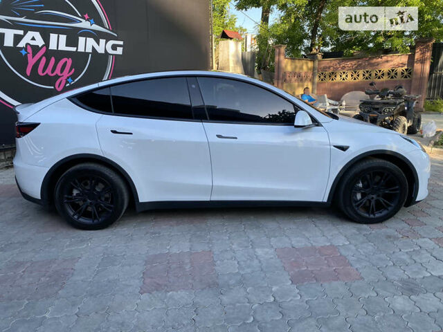 Белый Тесла Model Y, объемом двигателя 0 л и пробегом 62 тыс. км за 29000 $, фото 6 на Automoto.ua