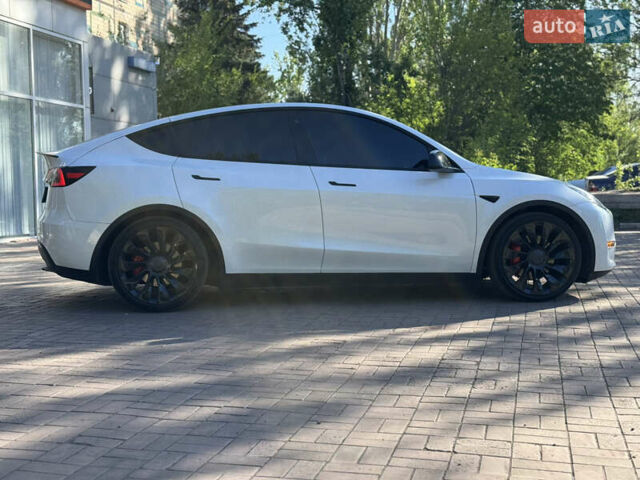 Белый Тесла Model Y, объемом двигателя 0 л и пробегом 84 тыс. км за 28000 $, фото 10 на Automoto.ua