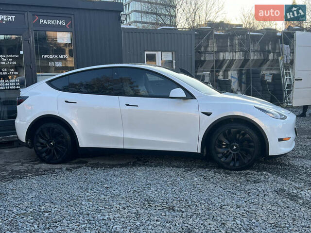 Белый Тесла Model Y, объемом двигателя 0 л и пробегом 55 тыс. км за 23490 $, фото 4 на Automoto.ua