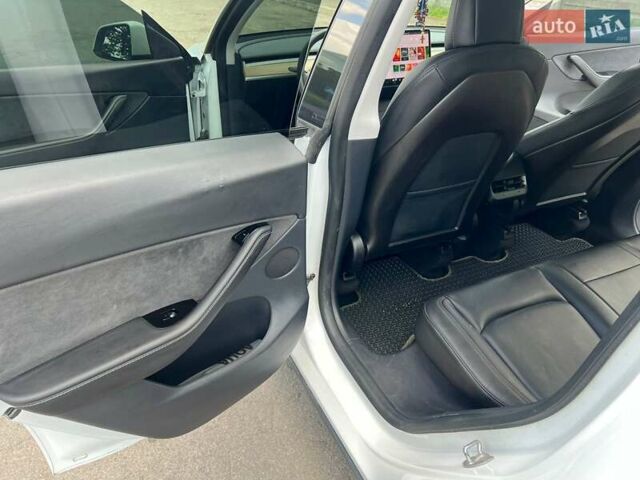 Білий Тесла Model Y, об'ємом двигуна 0 л та пробігом 67 тис. км за 25000 $, фото 11 на Automoto.ua