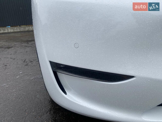 Білий Тесла Model Y, об'ємом двигуна 0 л та пробігом 70 тис. км за 24500 $, фото 37 на Automoto.ua