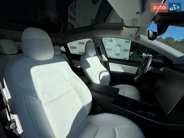 Білий Тесла Model Y, об'ємом двигуна 0 л та пробігом 123 тис. км за 15700 $, фото 17 на Automoto.ua