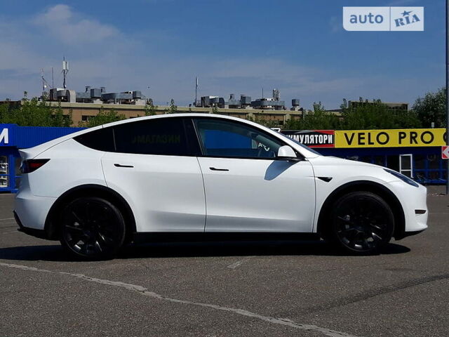 Белый Тесла Model Y, объемом двигателя 0 л и пробегом 18 тыс. км за 59500 $, фото 43 на Automoto.ua