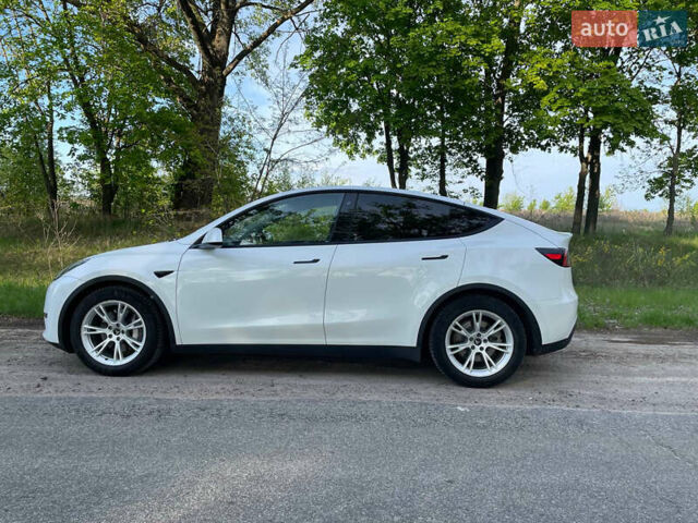 Белый Тесла Model Y, объемом двигателя 0 л и пробегом 80 тыс. км за 38000 $, фото 1 на Automoto.ua