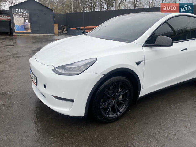 Білий Тесла Model Y, об'ємом двигуна 0 л та пробігом 70 тис. км за 24500 $, фото 12 на Automoto.ua