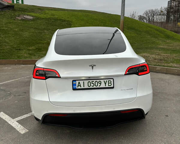 Білий Тесла Model Y, об'ємом двигуна 0 л та пробігом 70 тис. км за 28000 $, фото 26 на Automoto.ua