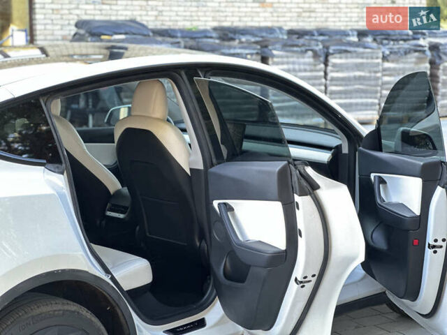 Белый Тесла Model Y, объемом двигателя 0 л и пробегом 118 тыс. км за 21700 $, фото 35 на Automoto.ua