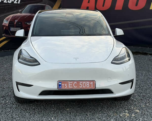 Білий Тесла Model Y, об'ємом двигуна 0 л та пробігом 100 тис. км за 21499 $, фото 1 на Automoto.ua