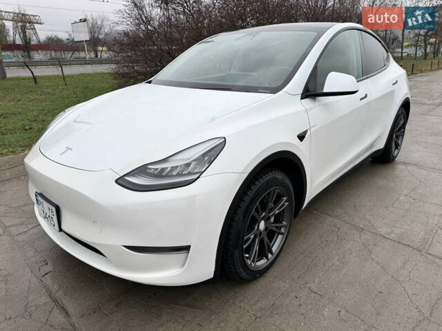 Белый Тесла Model Y, объемом двигателя 0 л и пробегом 77 тыс. км за 25000 $, фото 42 на Automoto.ua