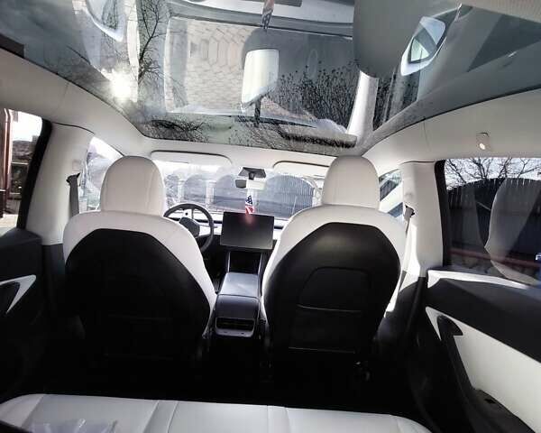 Белый Тесла Model Y, объемом двигателя 0 л и пробегом 113 тыс. км за 24700 $, фото 76 на Automoto.ua