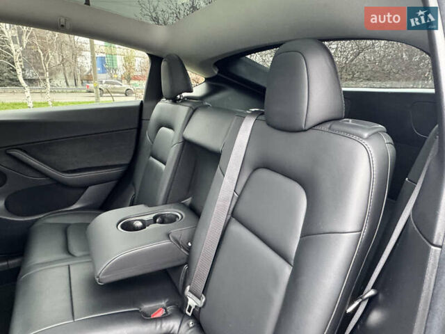 Белый Тесла Model Y, объемом двигателя 0 л и пробегом 77 тыс. км за 25000 $, фото 26 на Automoto.ua