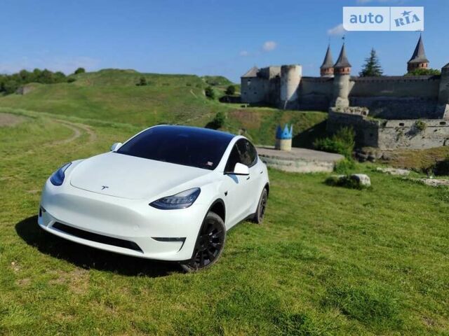 Білий Тесла Model Y, об'ємом двигуна 0 л та пробігом 150 тис. км за 28000 $, фото 2 на Automoto.ua