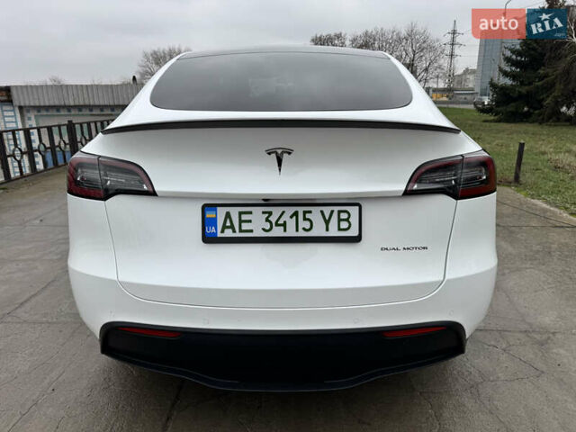 Белый Тесла Model Y, объемом двигателя 0 л и пробегом 77 тыс. км за 25000 $, фото 37 на Automoto.ua