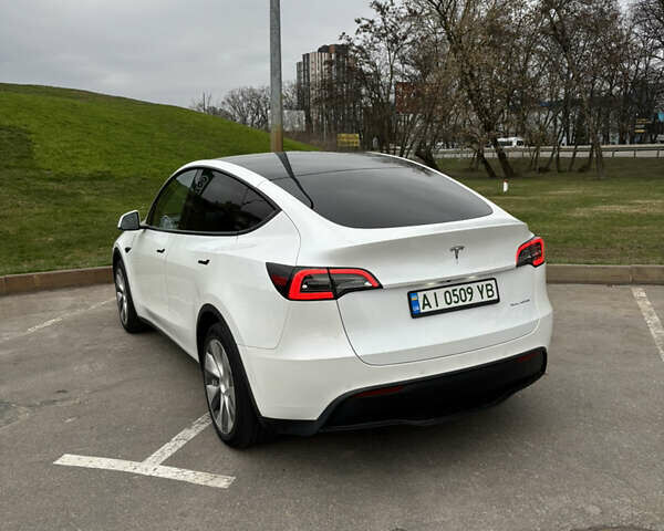 Білий Тесла Model Y, об'ємом двигуна 0 л та пробігом 70 тис. км за 28000 $, фото 23 на Automoto.ua