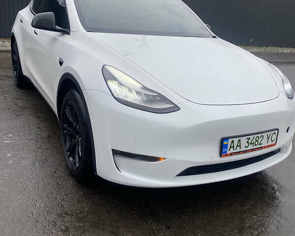 Білий Тесла Model Y, об'ємом двигуна 0 л та пробігом 70 тис. км за 24500 $, фото 1 на Automoto.ua