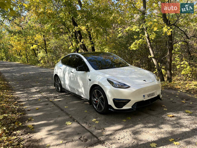 Білий Тесла Model Y, об'ємом двигуна 0 л та пробігом 126 тис. км за 28800 $, фото 8 на Automoto.ua