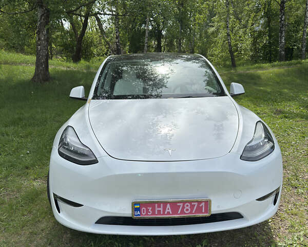 Белый Тесла Model Y, объемом двигателя 0 л и пробегом 75 тыс. км за 26000 $, фото 2 на Automoto.ua